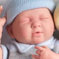 La New Born niño traje azul