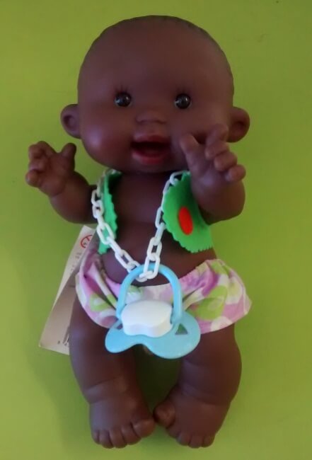 Pepote niño negrito chaleco verde